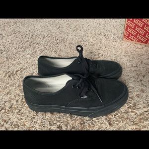 All black Authentic Vans